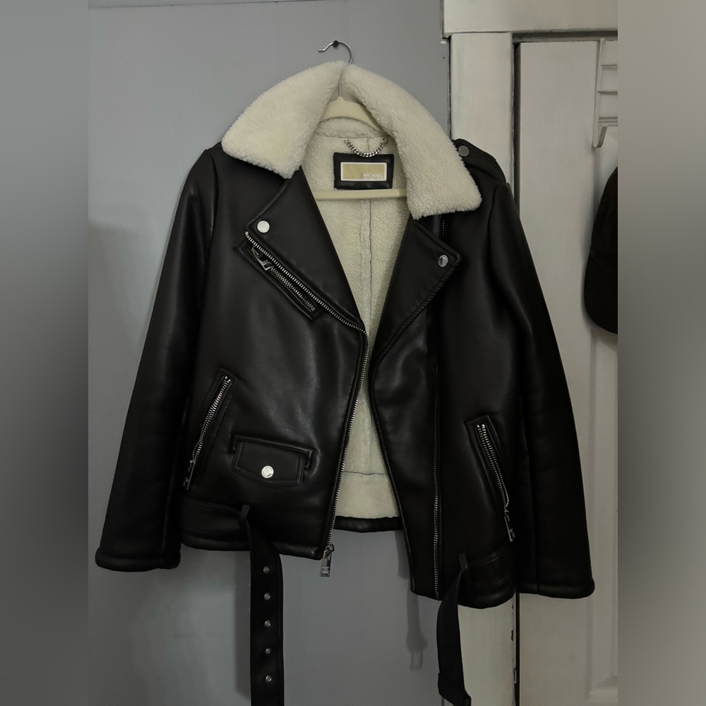 Sherpa lined Michael Kord leather jacket.